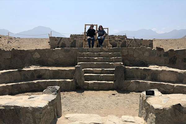 Couple visiting Caral´s Amphiteather