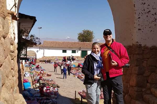 Happy couple visiting Chinchero Market