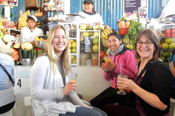 Drinking Juice at Cusco Market