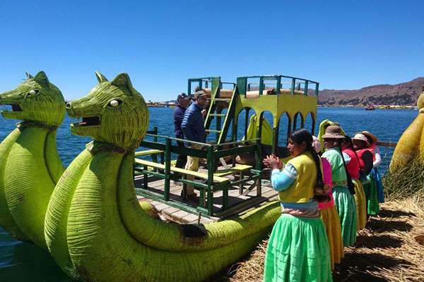 Uros Island Villagers Happy Greeting to Visitors