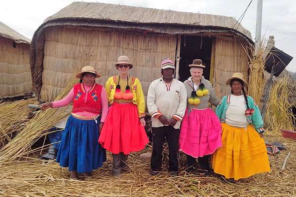 Visitors in Traditional Clothings at Uros Island