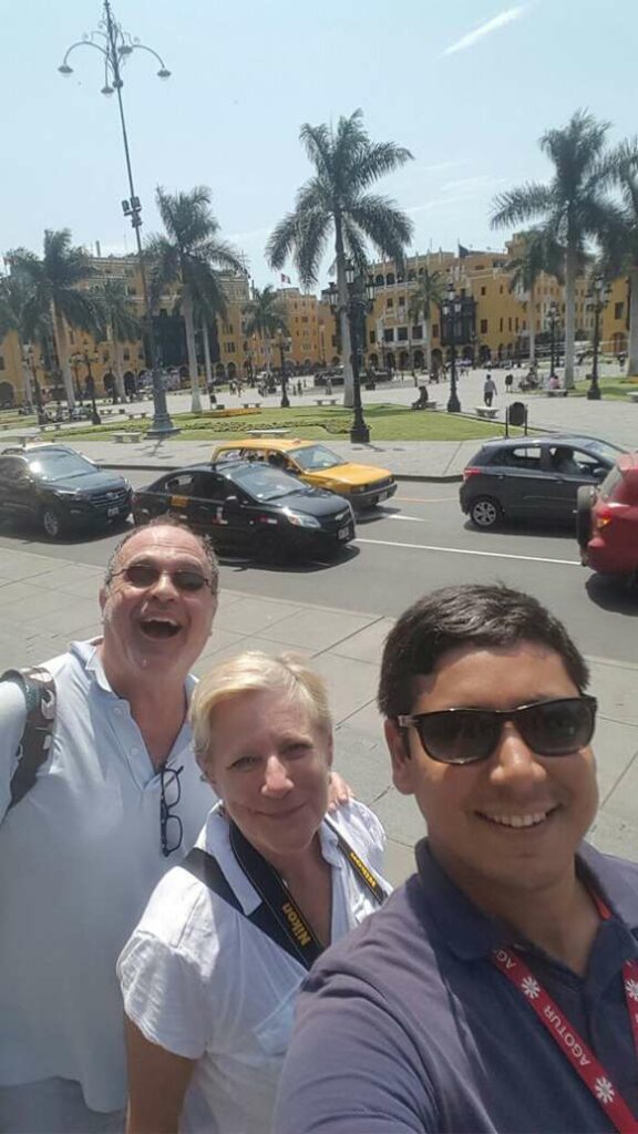 guide and couple happy in lima centre main plaza